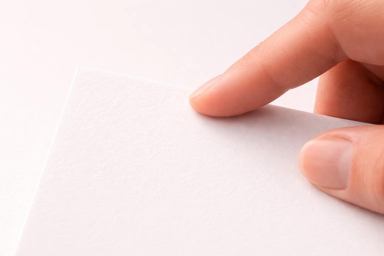 Close-up of soft-touch laminated packaging stock with a velvety matte surface