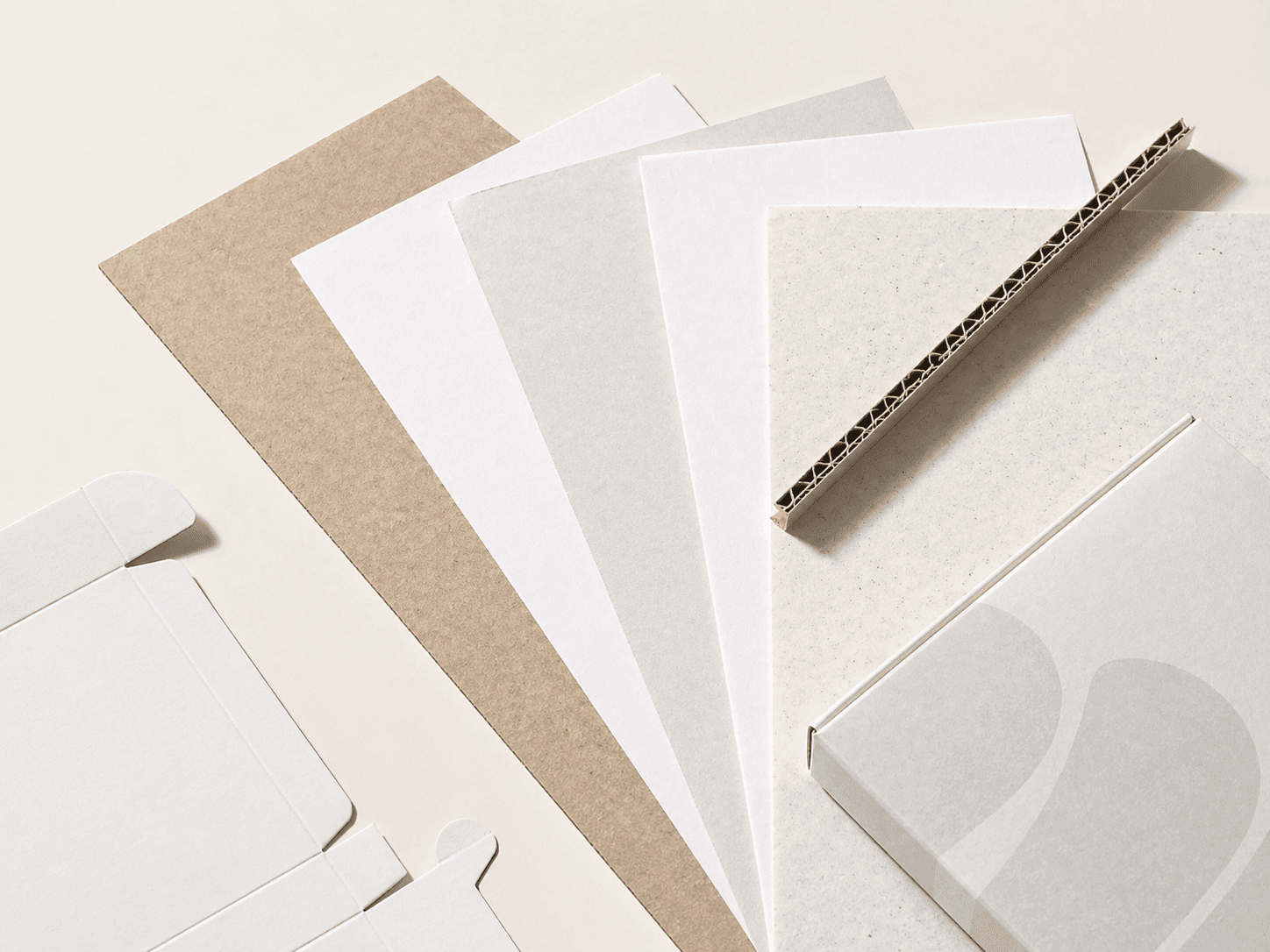 Paperboard, corrugated, kraft and rigid board samples for custom packaging material selection