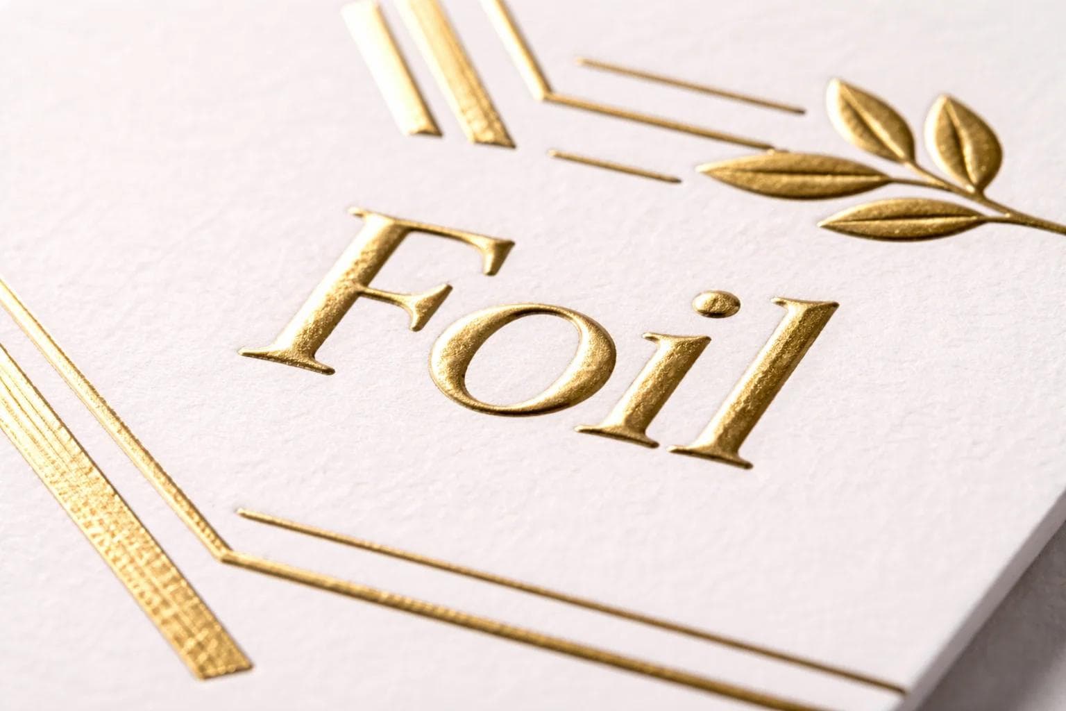 Hot foil stamping pressed into packaging stock with crisp metallic detail