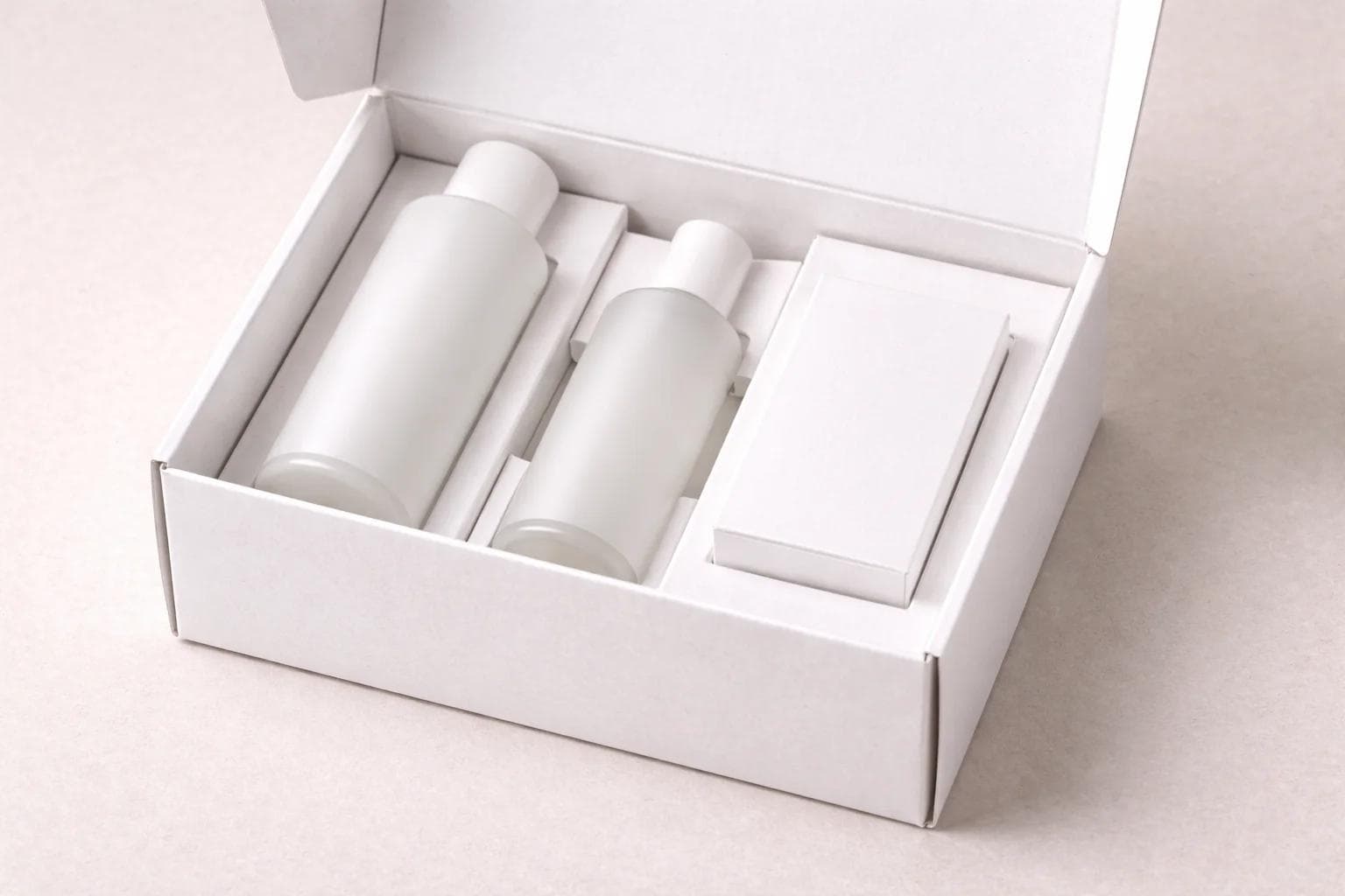 Open box with folded paperboard inserts holding product forms neatly in place